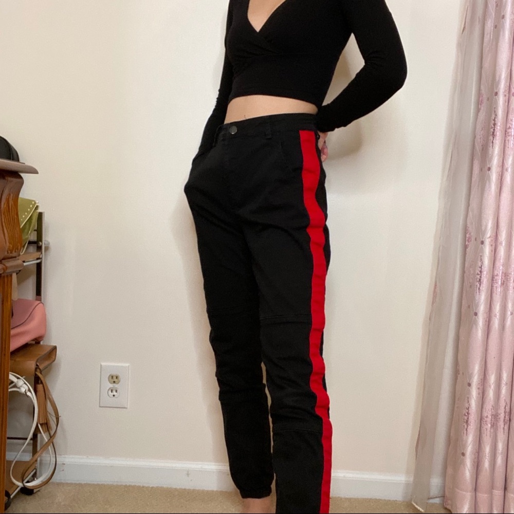 Black pants with red stripe